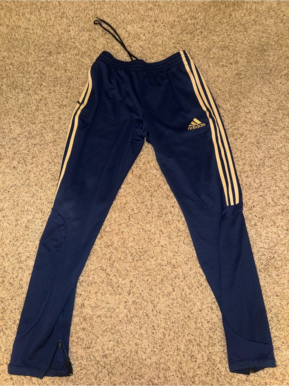 Adidas men size medium  Navy Track Pants with gold Stripes